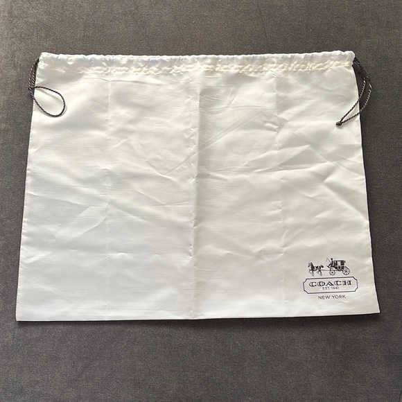 Coach Handbags - COACH Ivory Satin drawstring Dust Bag big never used